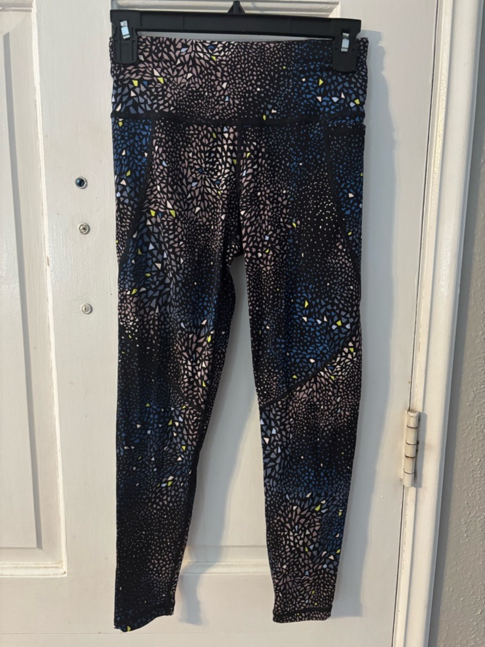Sweaty Betty Black Patterned Leggings with Blue and Yellow Accents
